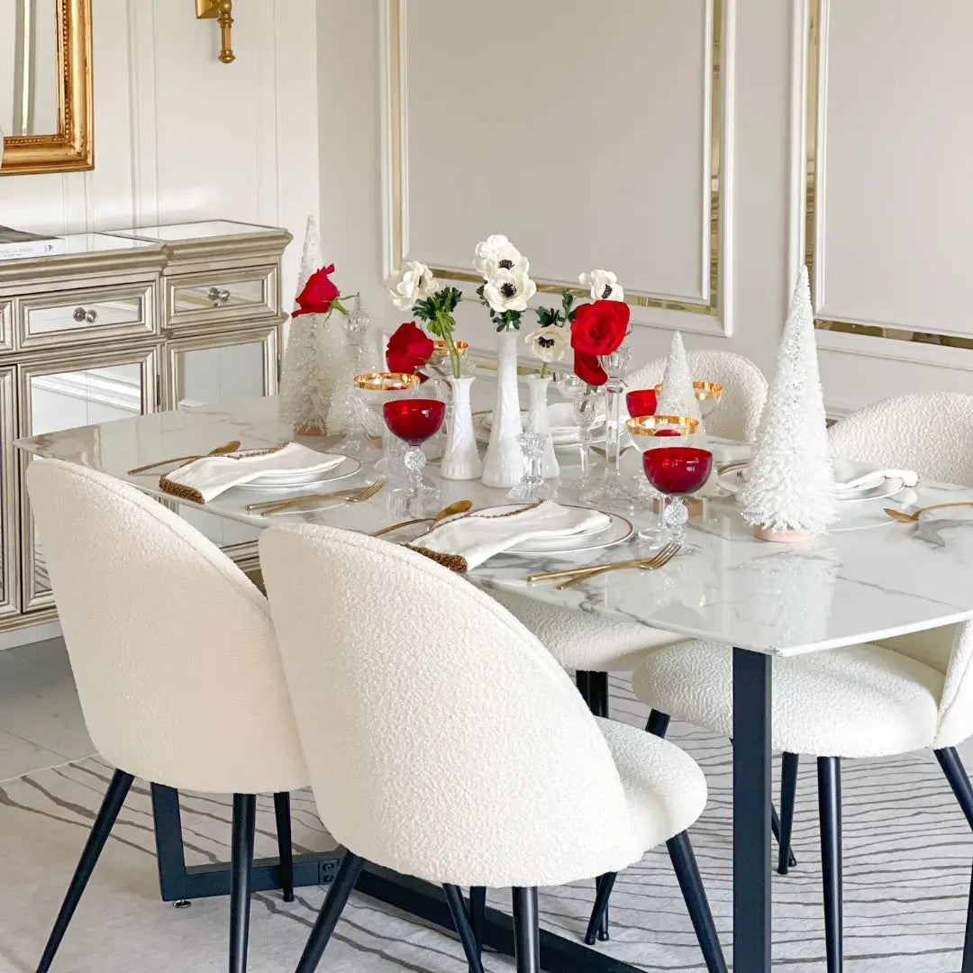 Rhon Modern Boucle Upholstered Dining Chair, elegant dining room with marble table, decorative items, striped rug.