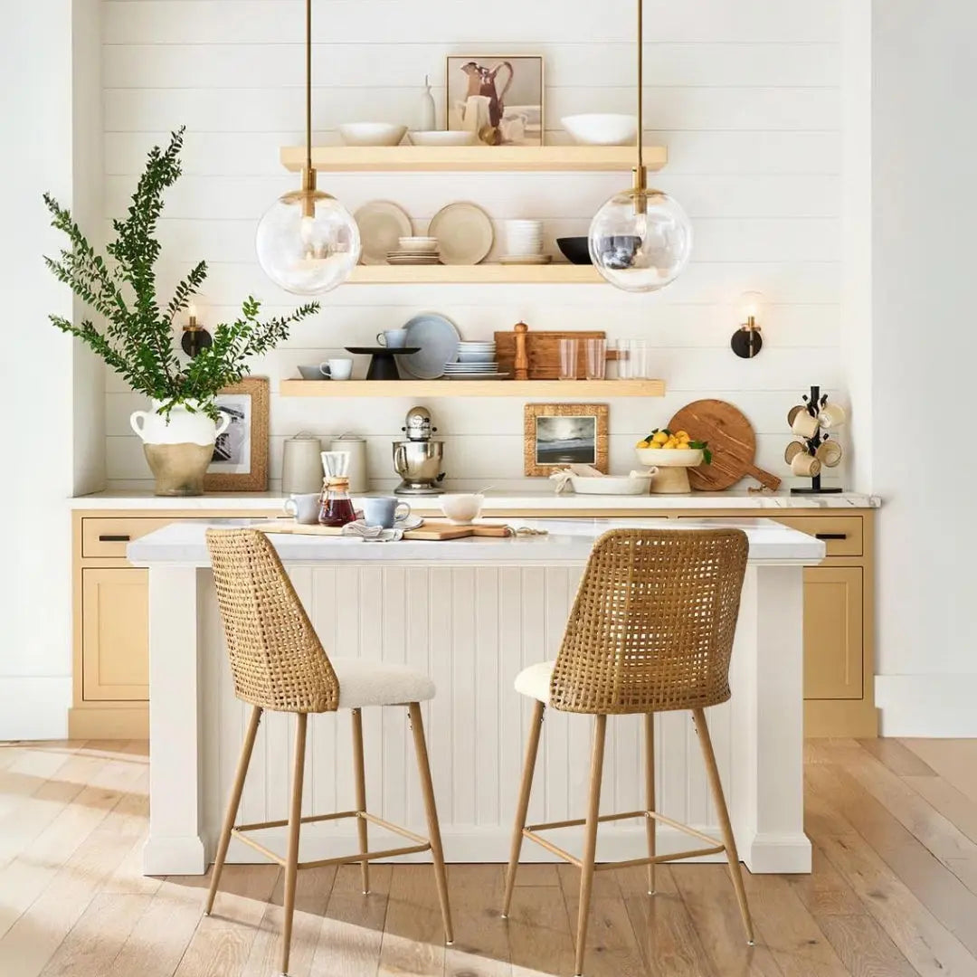 Nice Rattan Upholstered Counter Stool in modern kitchen with wood flooring and shiplap walls.