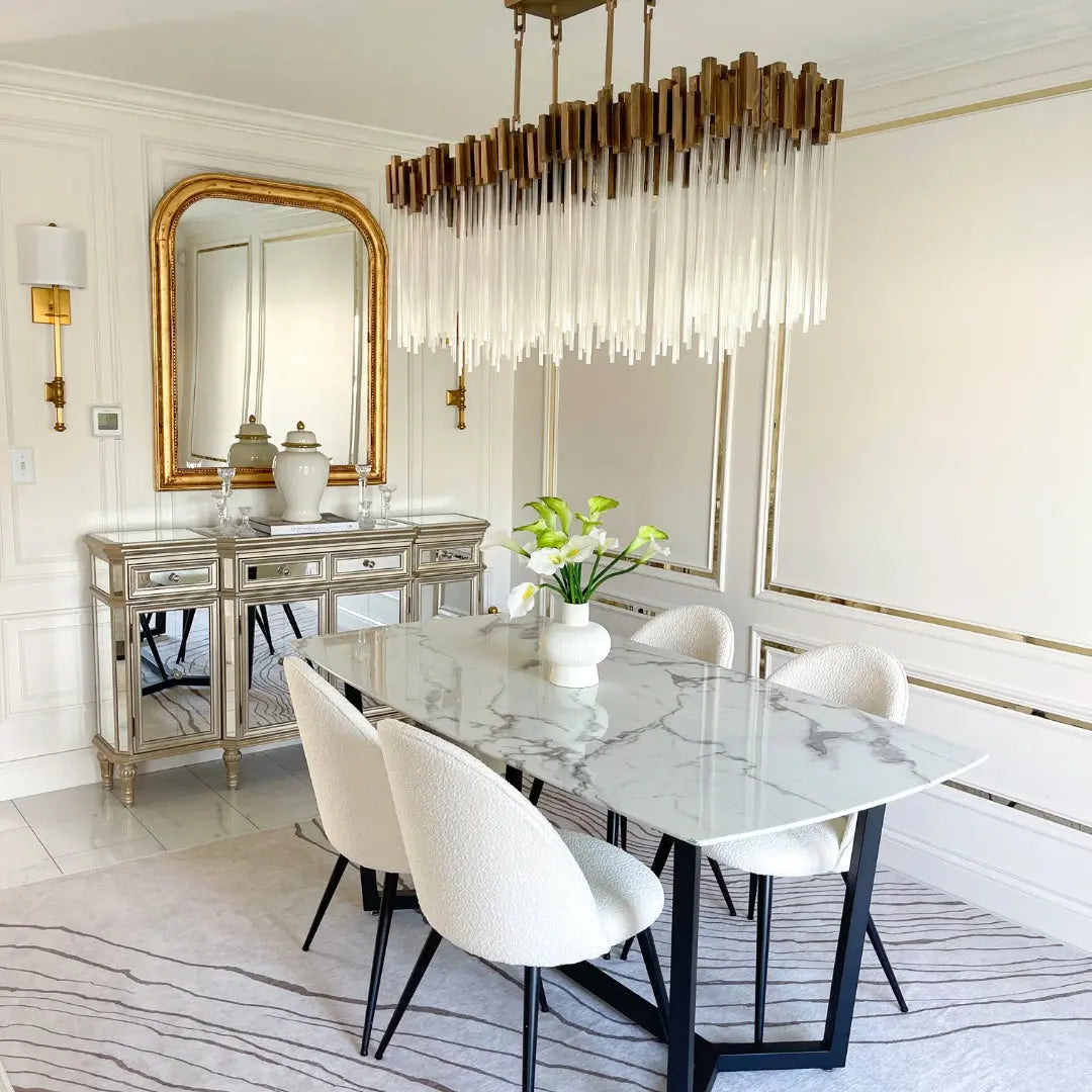 Rhon Modern Boucle Dining Chair in elegant dining room with mirrored console and marble tabletop.