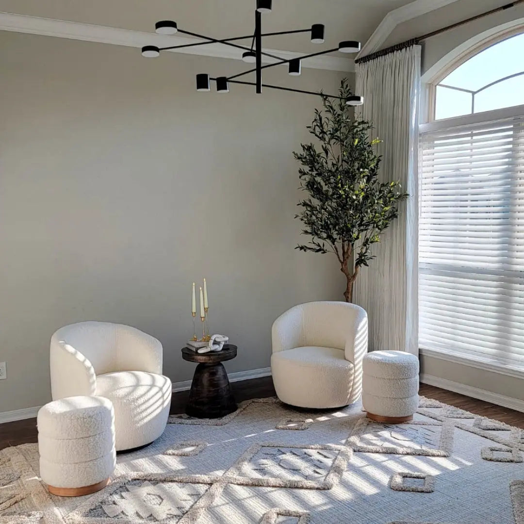 Bella Modern White Boucle Swivel Barrel Chair in elegant living room with neutral decor.