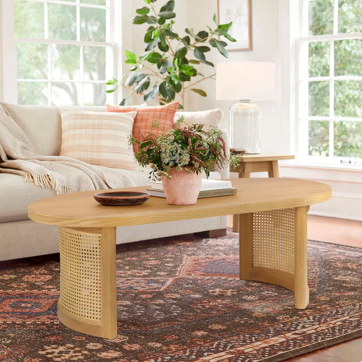 Aodai 48" Oak Rattan Coffee Table in cozy living room with beige sofa and patterned rug.