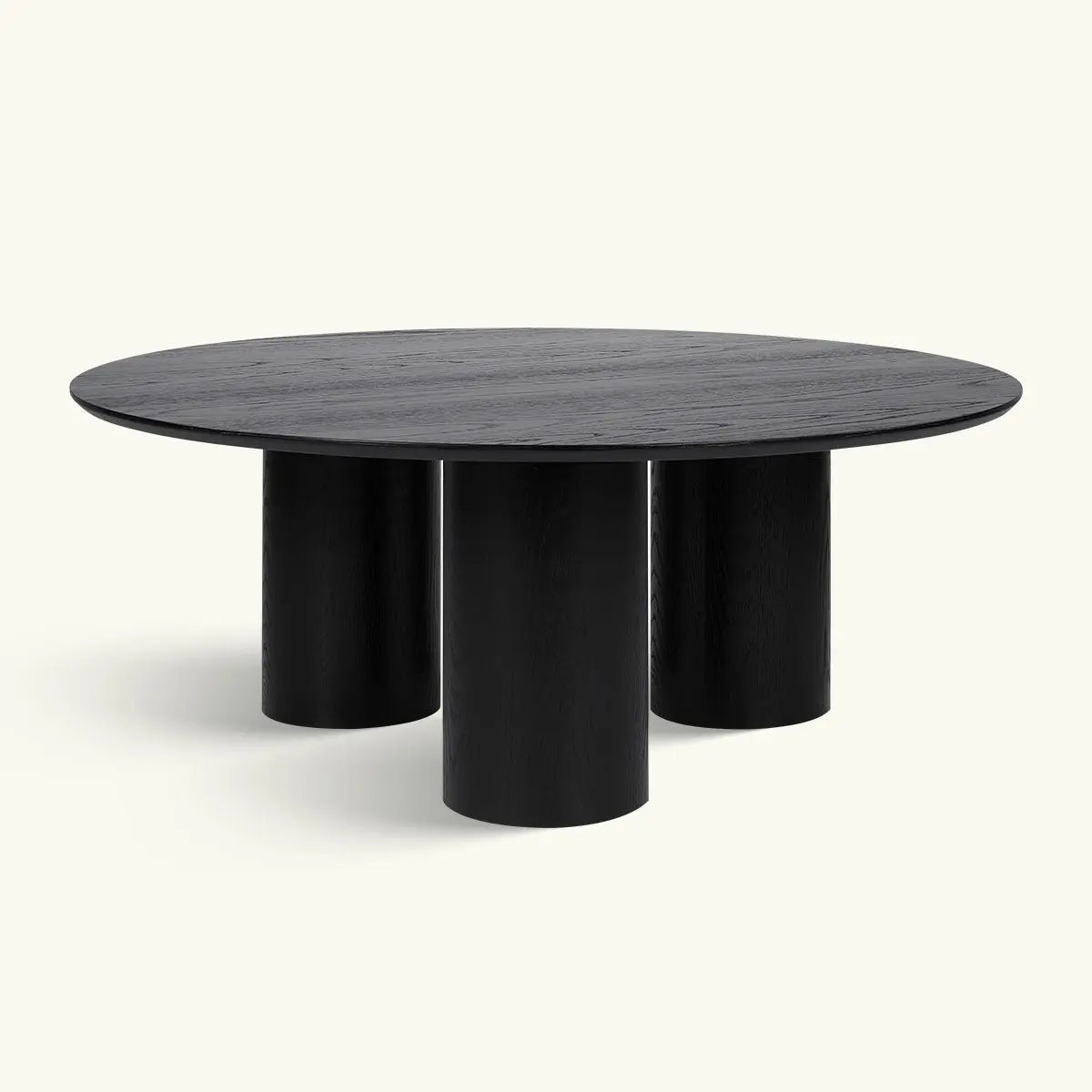 Baguette black oak round coffee table with three legs, modern style. Solid white background.