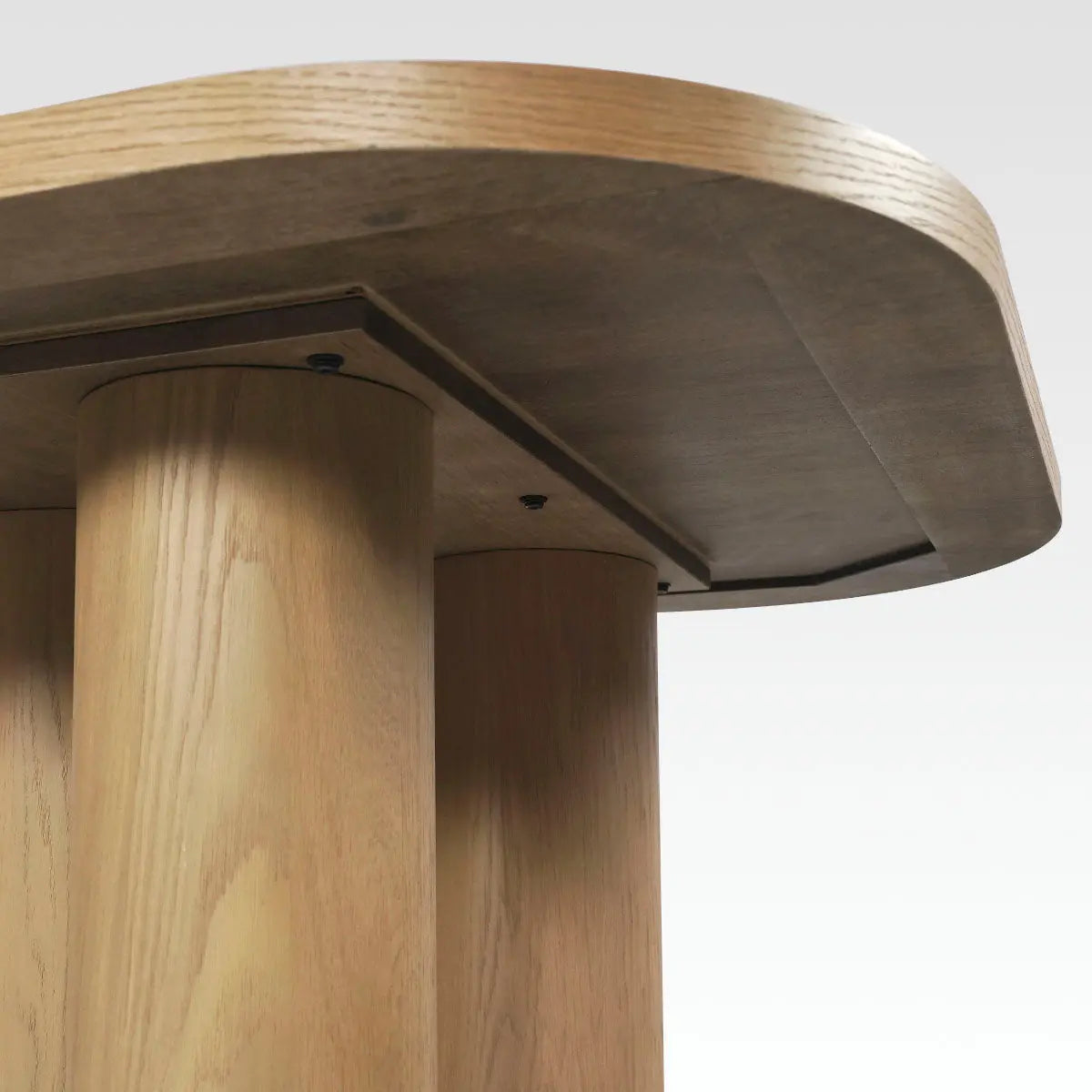 Close-up view of legs on Baguette Modern Rectangle Oak Dining Table, emphasizing oak texture and design.