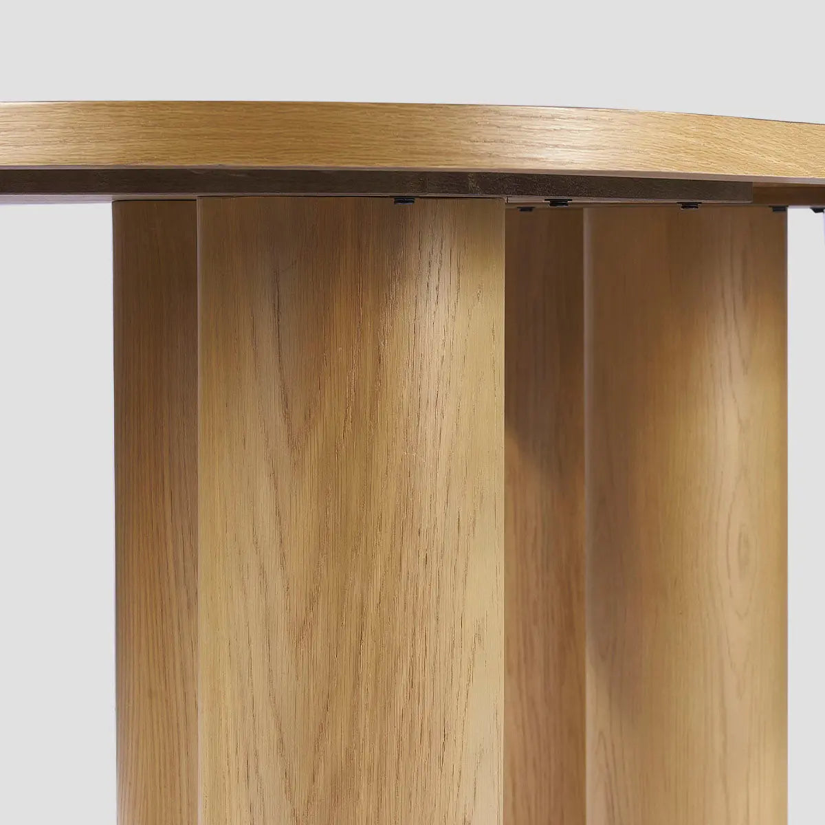 Close-up of Baguette Modern Rectangle Oak Large Dining Table detail, showcasing wood grain texture.