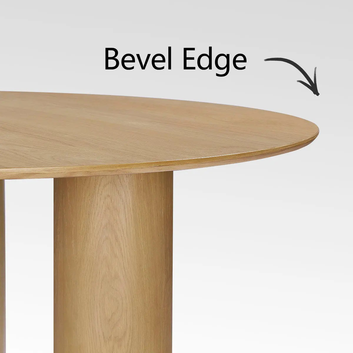 Baguette oak wood round table with bevel edge; modern design, three legs, no visible decor.