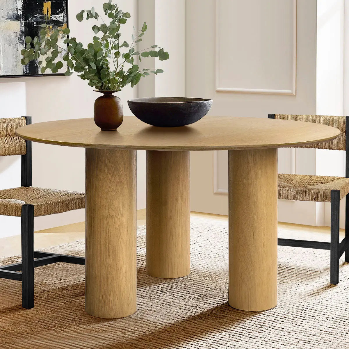 Baguette Modern Oak Wood Dining Table with three legs, paired with woven chairs, beige room.