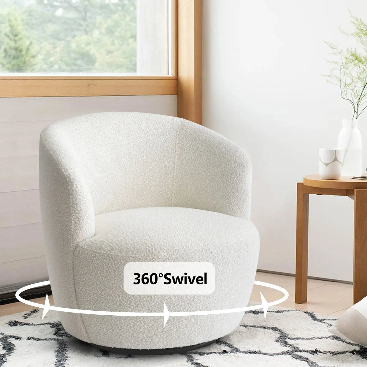 Bella Modern white boucle swivel chair in cozy living room with wooden side table and rug.