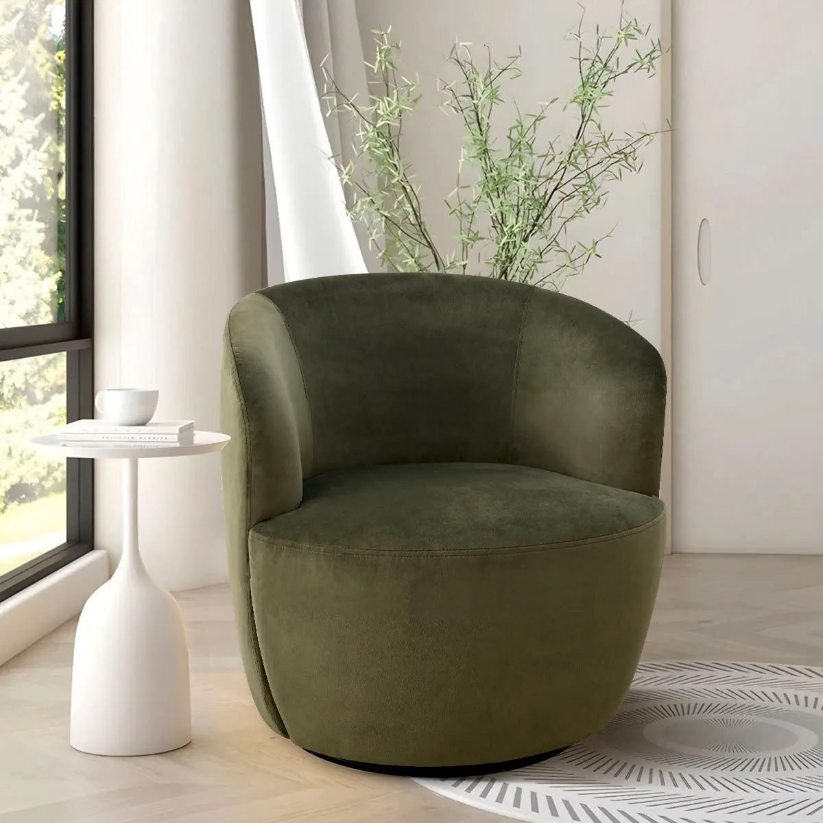 Bella Modern Olive Green Velvet Swivel Barrel Chair in stylish living room with light wood flooring.