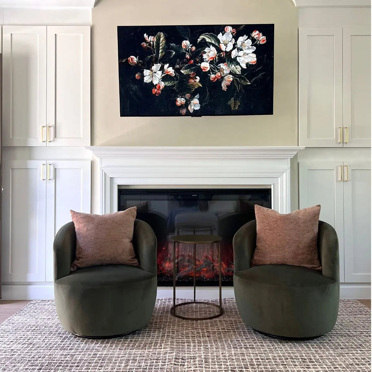 Two Bella Modern Olive Green Velvet Swivel Barrel Chairs in elegant living room with fireplace.