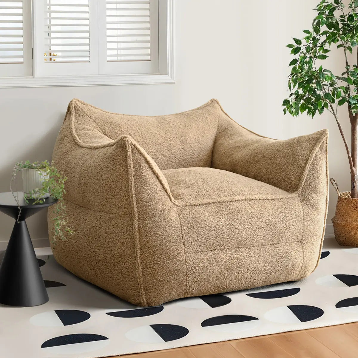 Boring Upholstered Teddy Fabric Bean Bag Chair in living room with geometric rug, light walls, hardwood flooring.