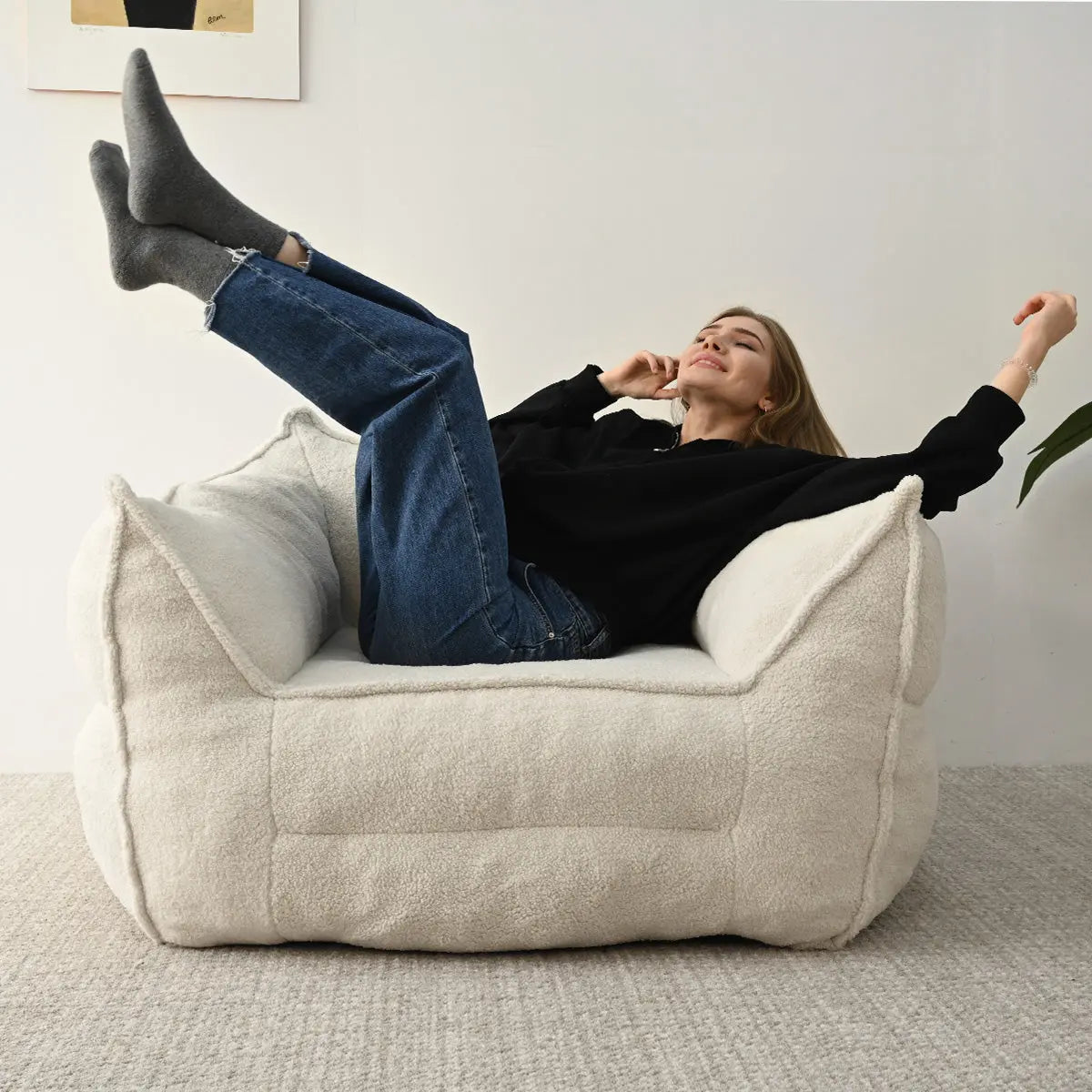 Boring Teddy Fabric Bean Bag Chair in cozy living room, beige carpet, white wall, relaxed setting.