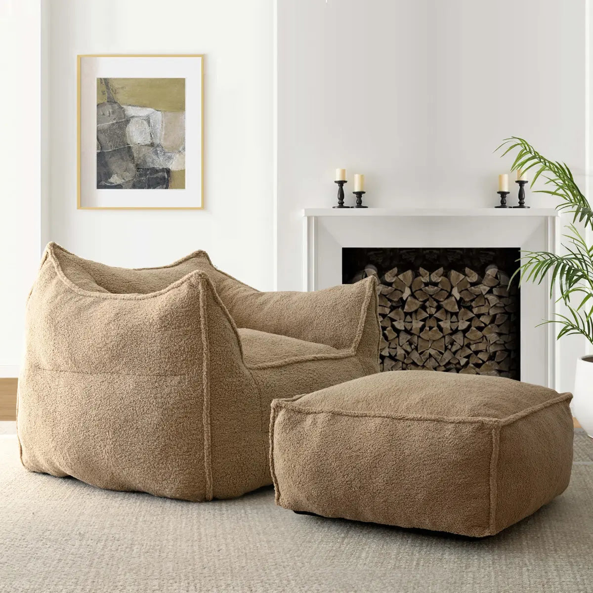 Boring Teddy Fabric Bean Bag Chair & Ottoman Set in cozy living room with fireplace and art.