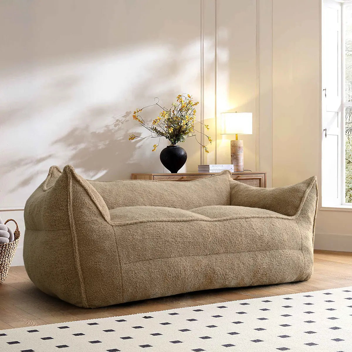 Boring Large Teddy Fabric Bean Bag Loveseat Sofa in cozy living room with neutral wall tones.