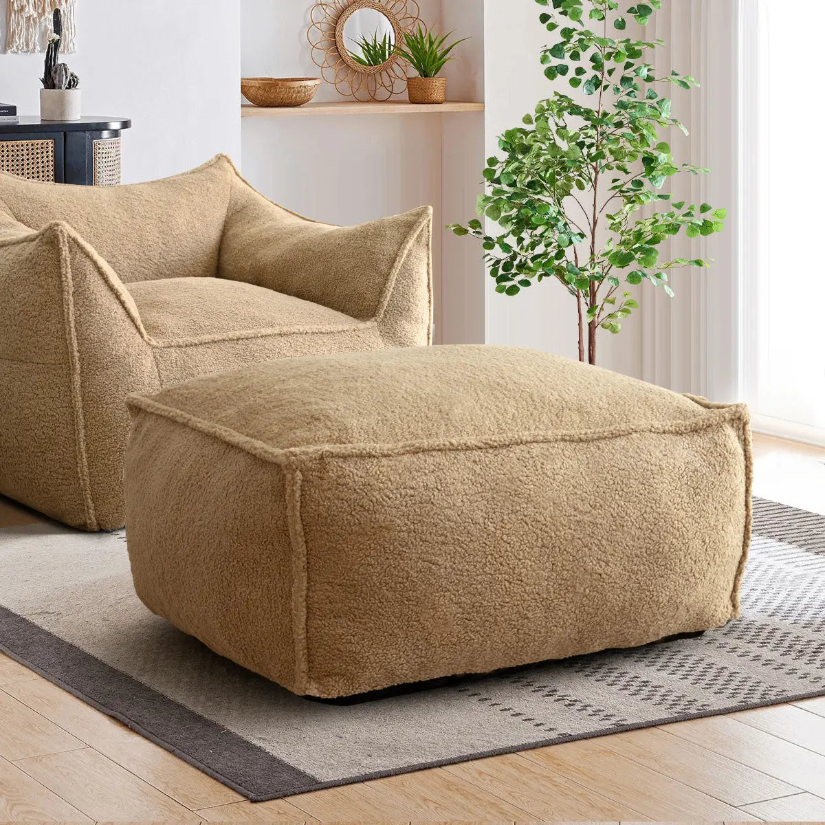 Boring Teddy Fabric Bean Bag Chair in cozy living room, beige sofa, light wood flooring, green plant.