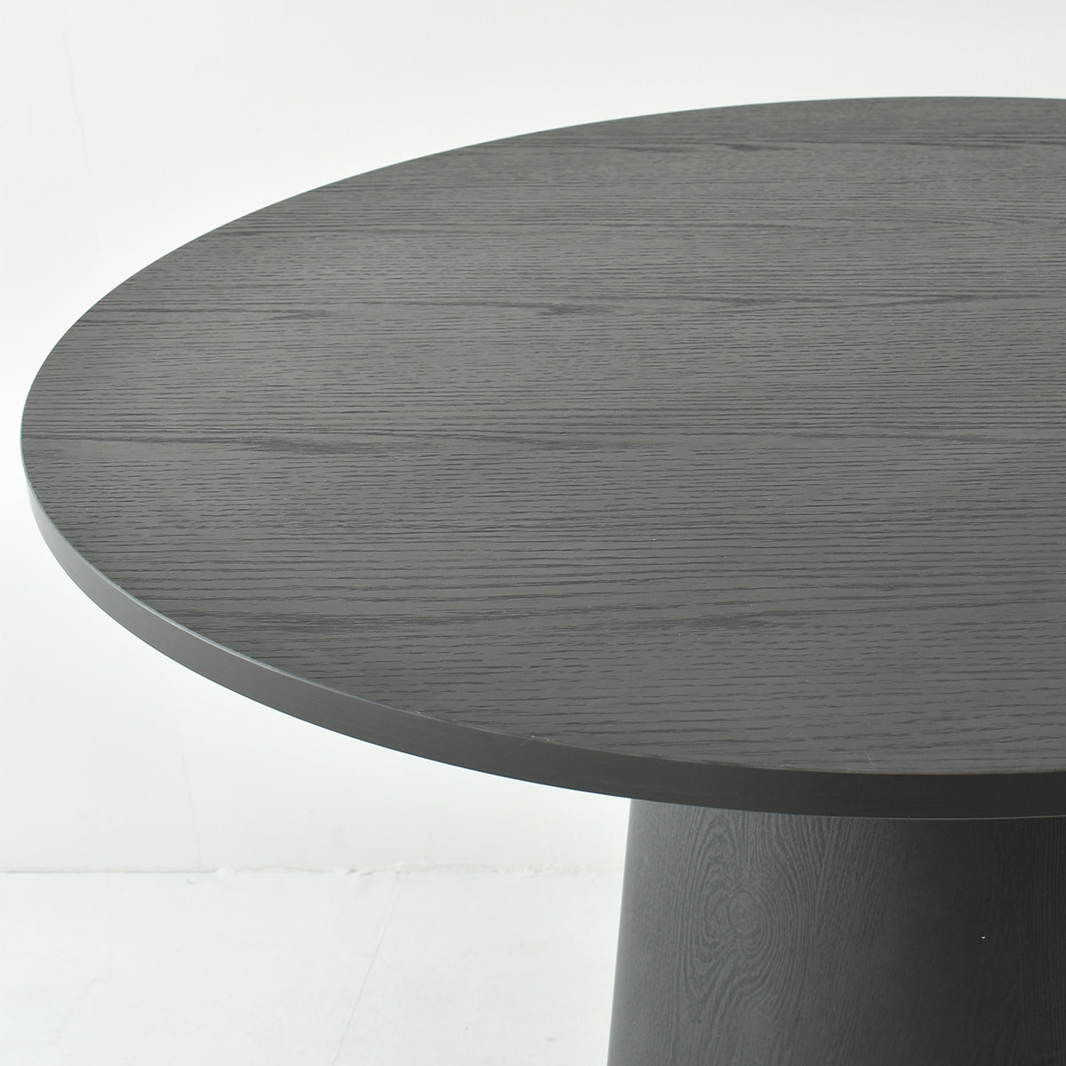 Dwen Modern Round Pedestal Dining Table with dark wood finish on white background.