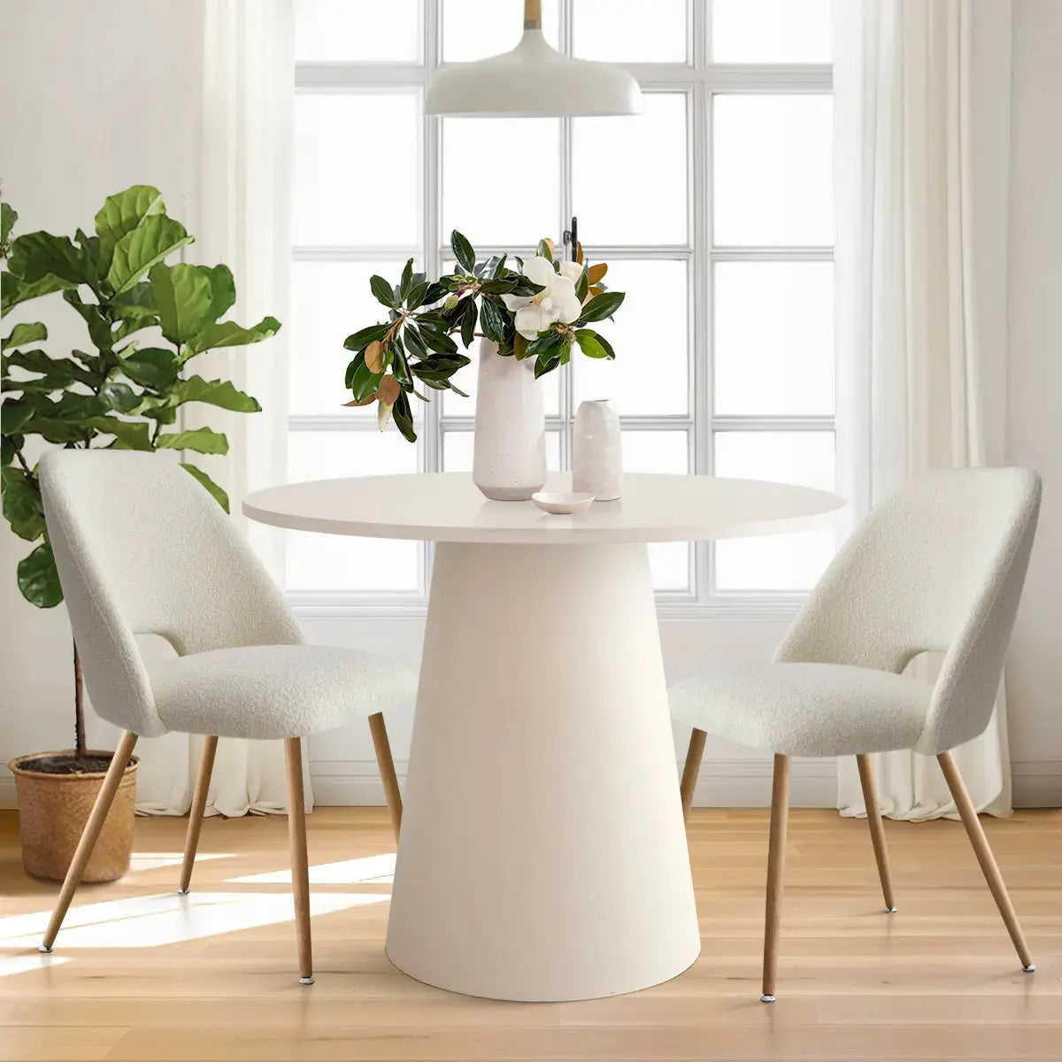 Edwin Modern Upholstered Dining Chair with round table in bright dining room, hardwood floor.