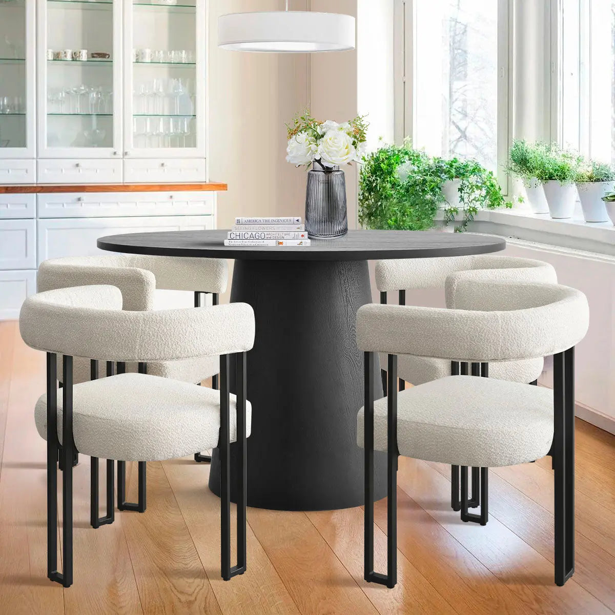 Dwen & Mia dining table set in kitchen with wood flooring, beige chairs, and glass cabinet.