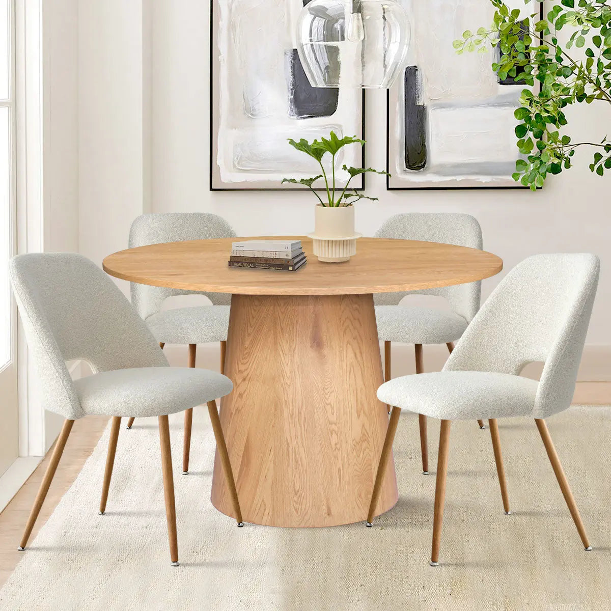 Dwen & Edwin 46" round dining table set, light wood, ivory chairs, abstract art, beige rug, dining room.