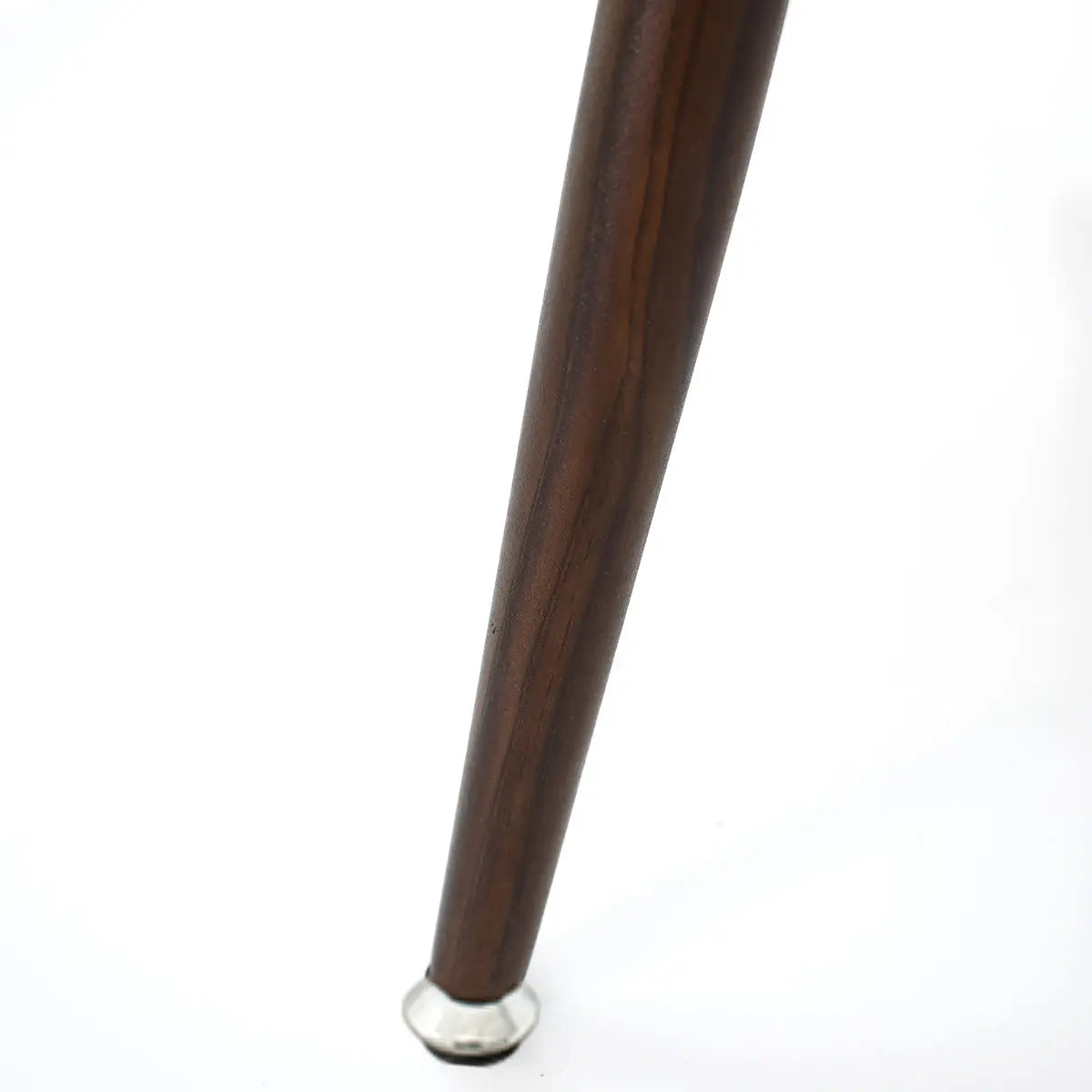 Close-up of leg from Edwin Modern Leather Dining Chair, featuring a sleek wooden finish.