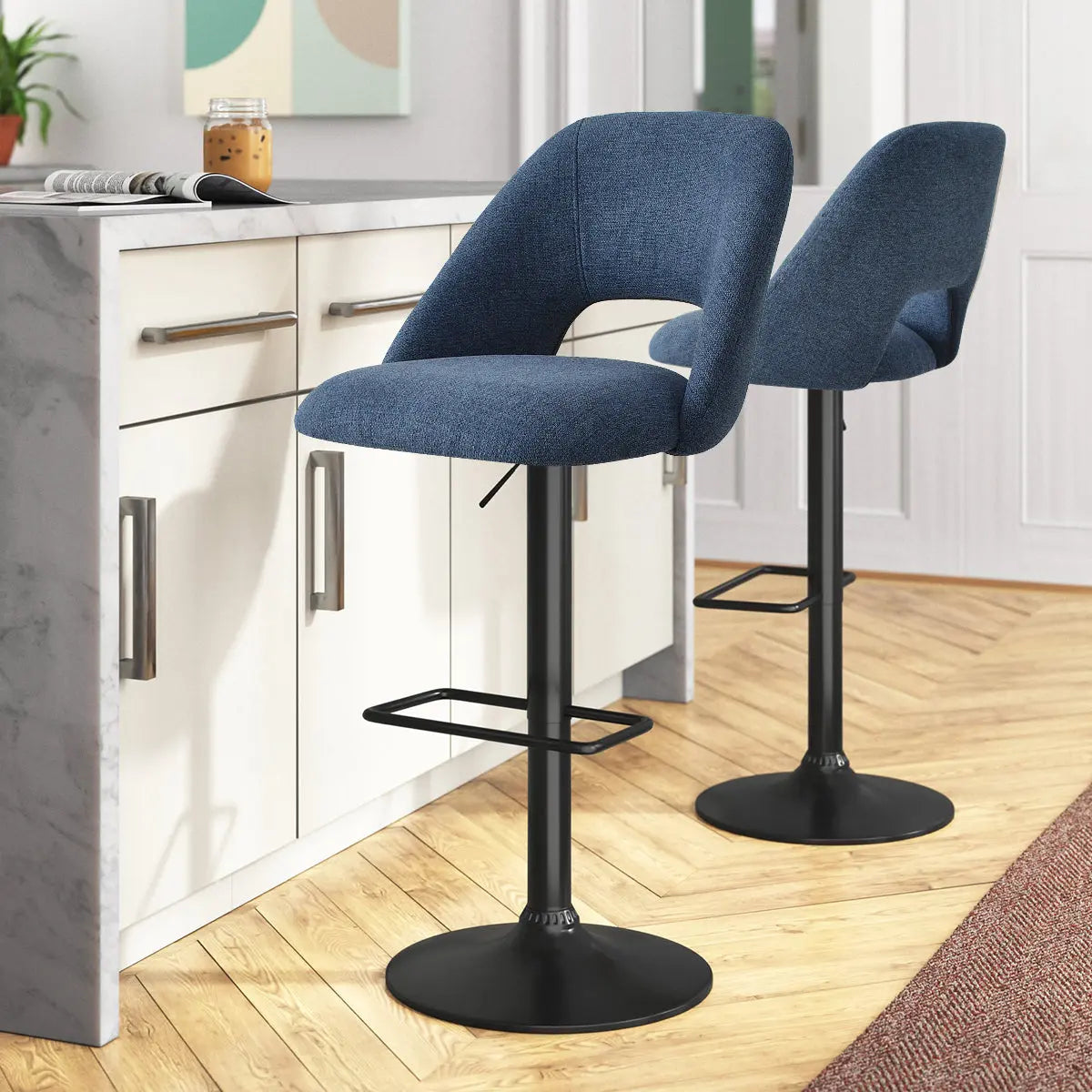 Edwin Modern Upholstered Swivel Counter Stool, blue, in kitchen with wood flooring, white cabinets.