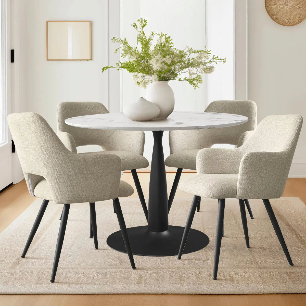 Edwin Modern Upholstered Dining Chair with Arms around round table in elegant dining room.