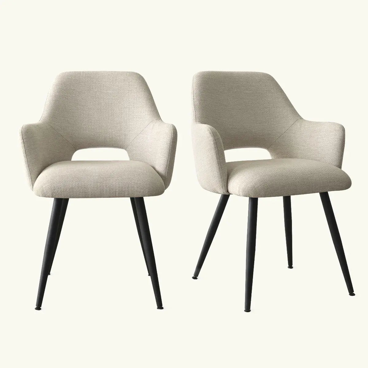 Edwin Modern upholstered dining chairs with arms, sleek legs, neutral color, contemporary design.