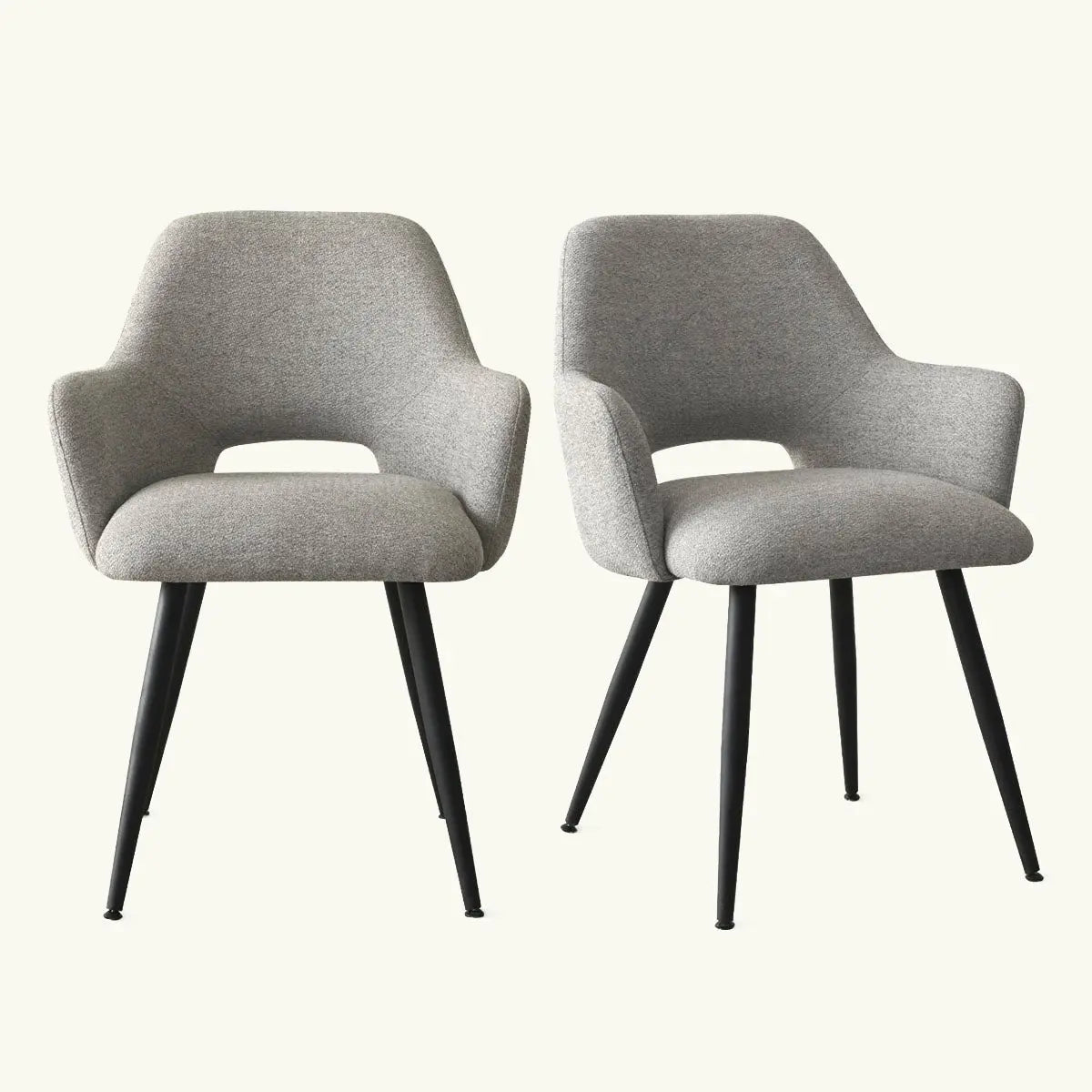 Edwin Modern Upholstered Dining Chair with Arms; gray upholstery, black legs, contemporary design.