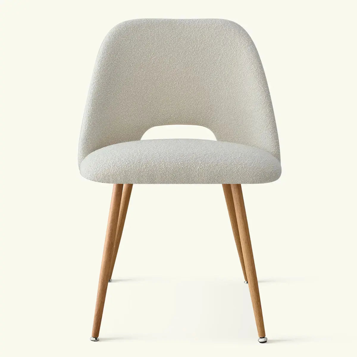 Edwin Modern Boucle dining chair with sleek design, wooden legs, perfect for contemporary dining rooms.