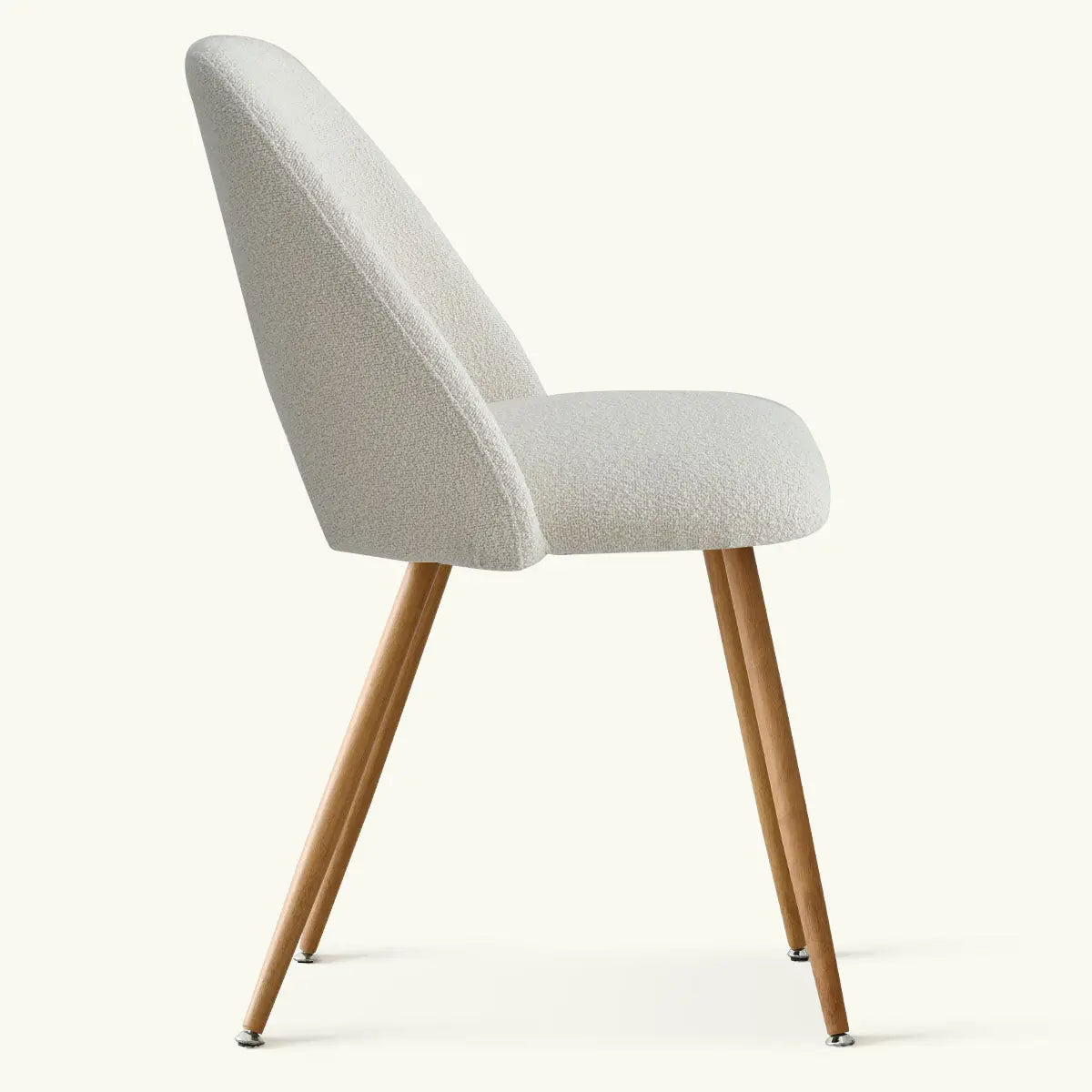 Edwin Modern Upholstered Dining Chair, beige with wooden legs, side view, minimalist style.