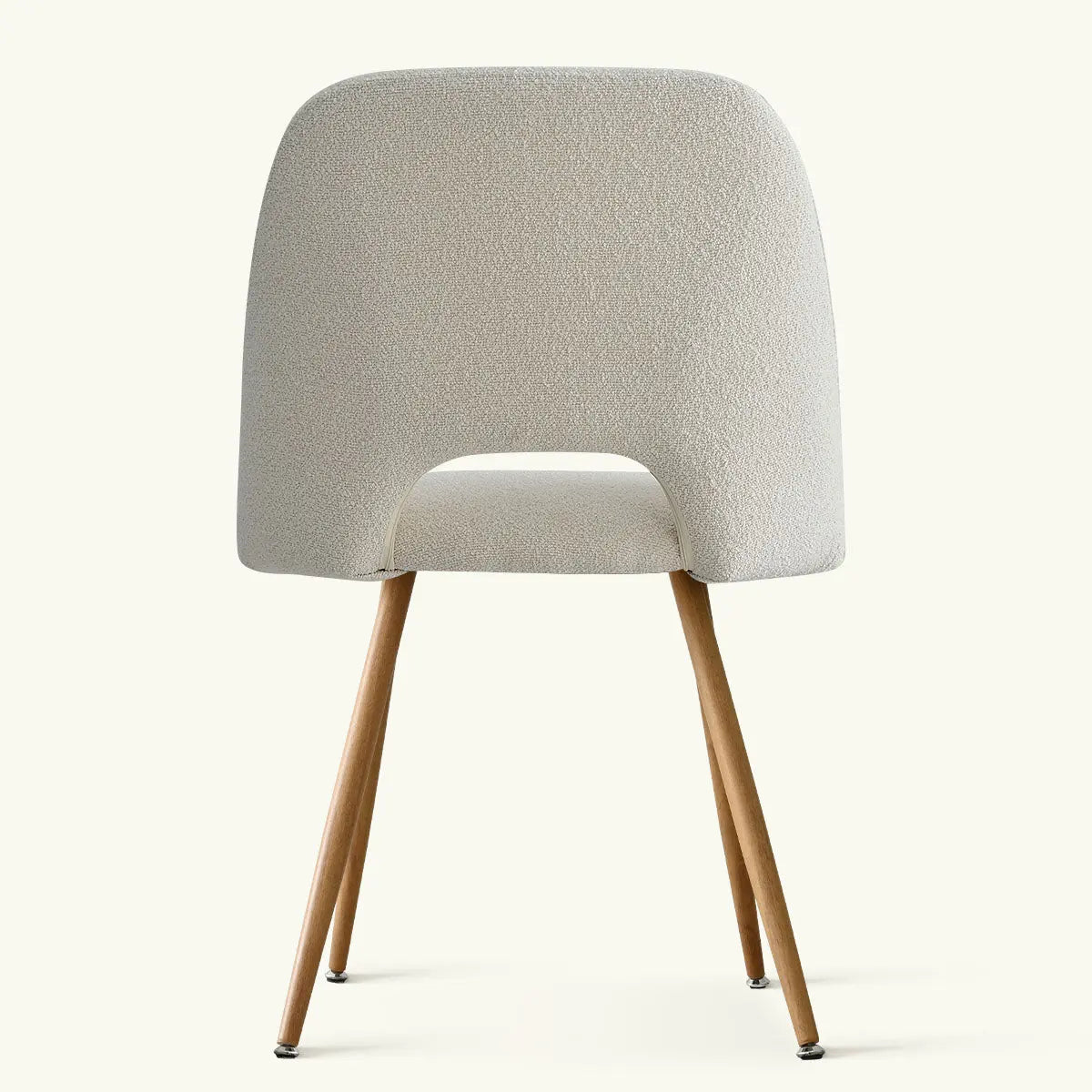 Edwin Modern Upholstered Dining Chair featuring sleek wood legs, minimalist design, cream upholstery.