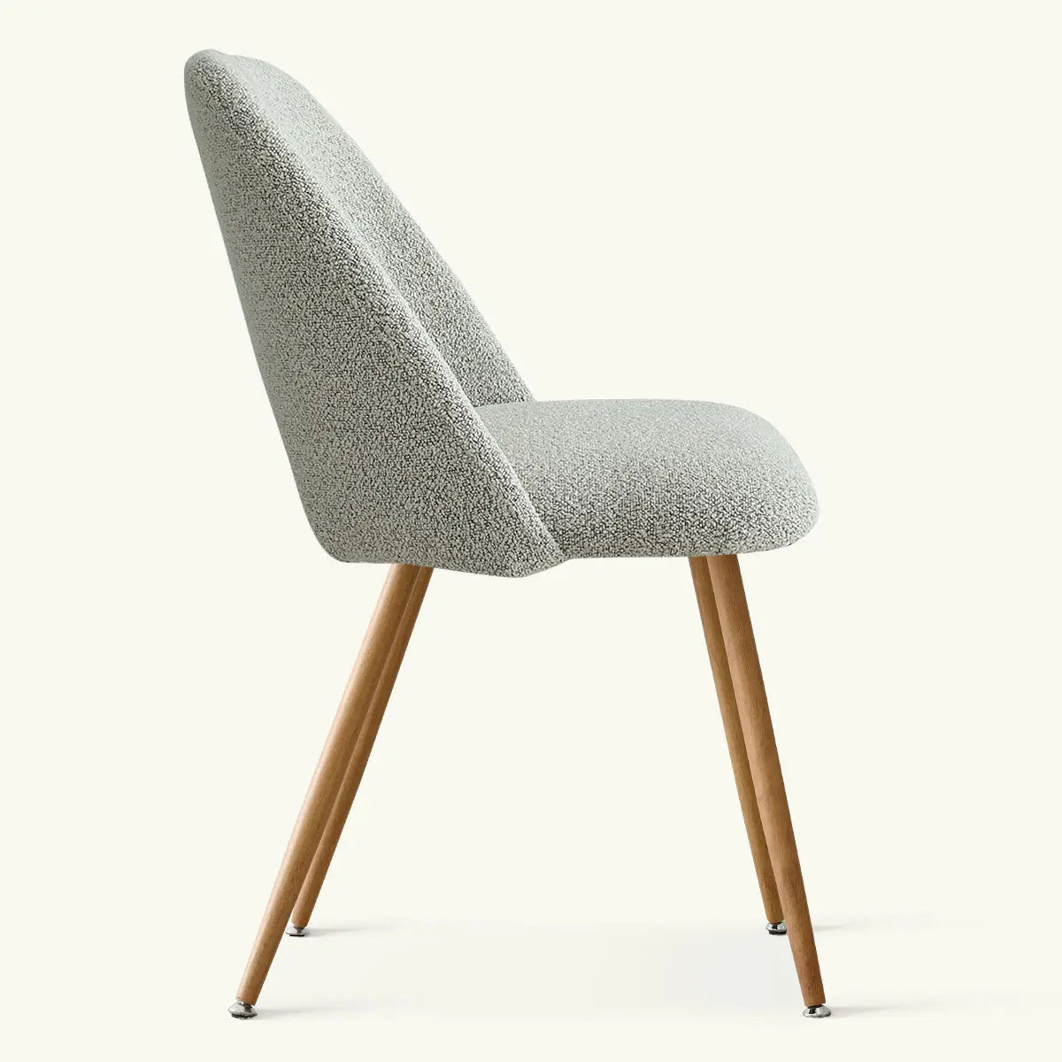 Edwin Modern Upholstered Dining Chair in gray fabric with wooden legs, side view, minimalist design.