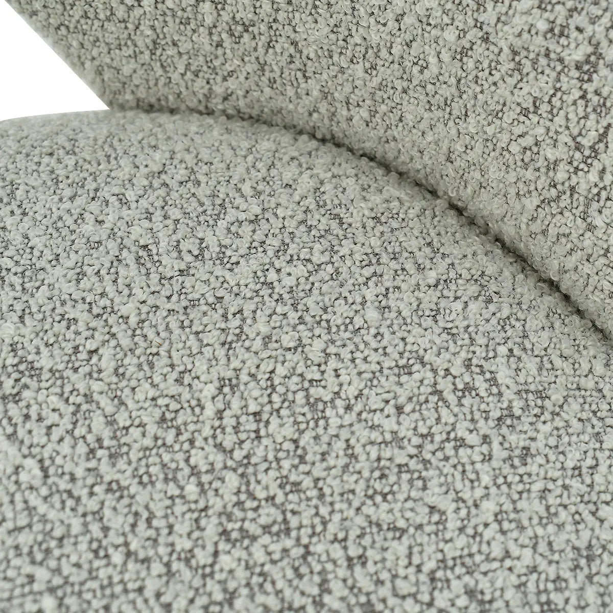 Close-up of textured upholstery on Edwin Modern Dining Chair with Metal Legs.