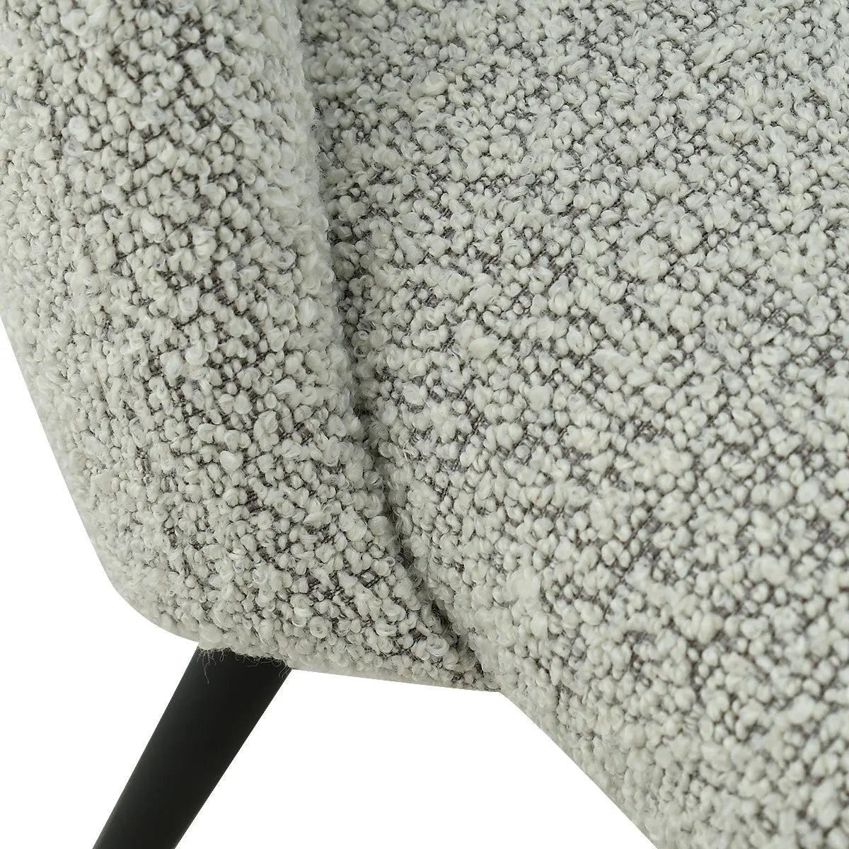 Close-up of Edwin Modern Upholstered Dining Chair's textured fabric and sleek metal leg design.