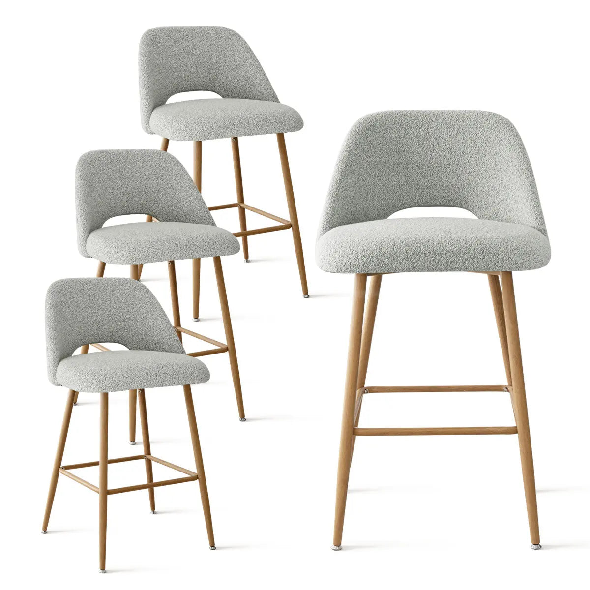 Set of Edwin Modern Boucle Upholstered Counter Stools, oak legs, stylish seating for kitchens.