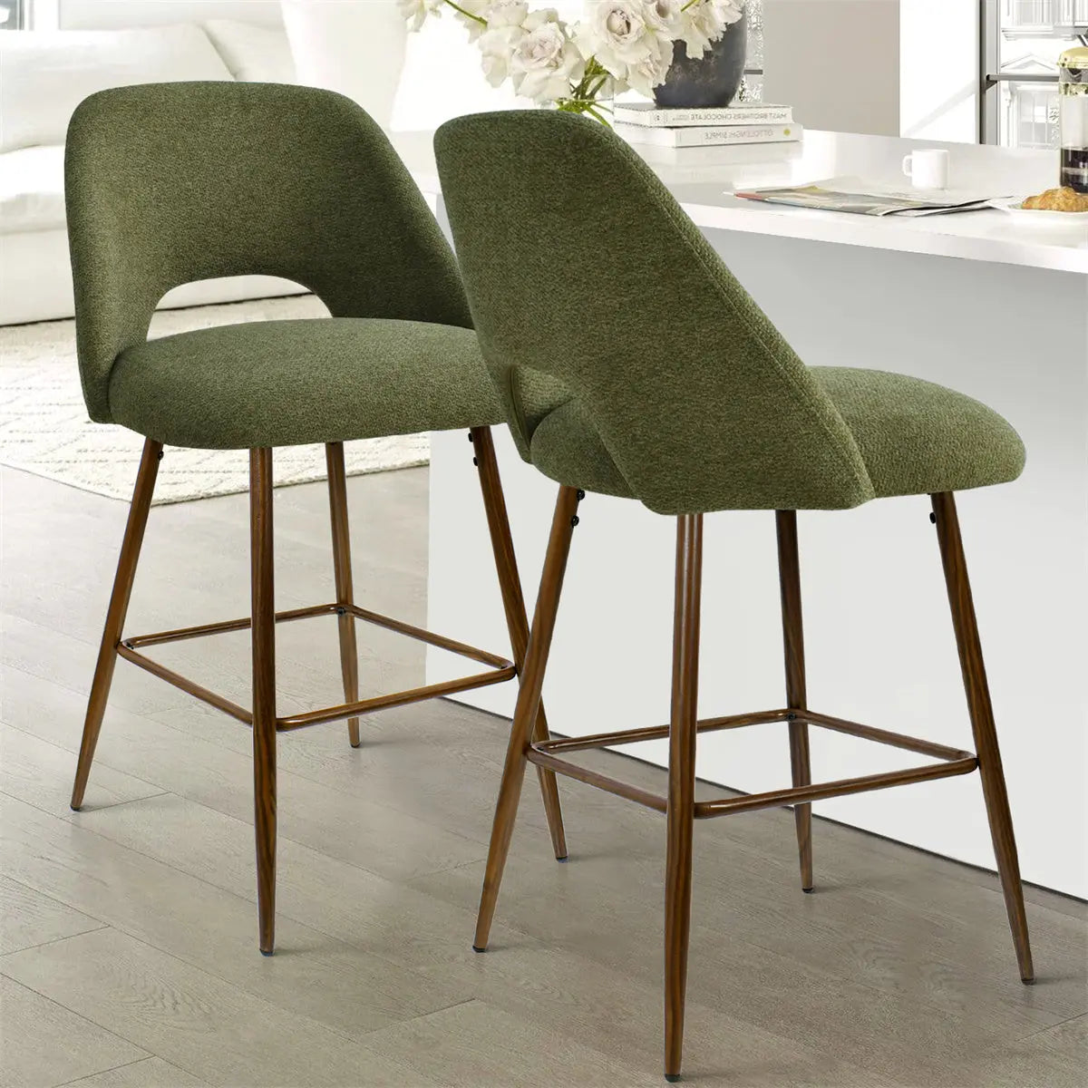 Edwin Modern Upholstered Counter Stool in kitchen with light wood flooring, white island, green upholstery.