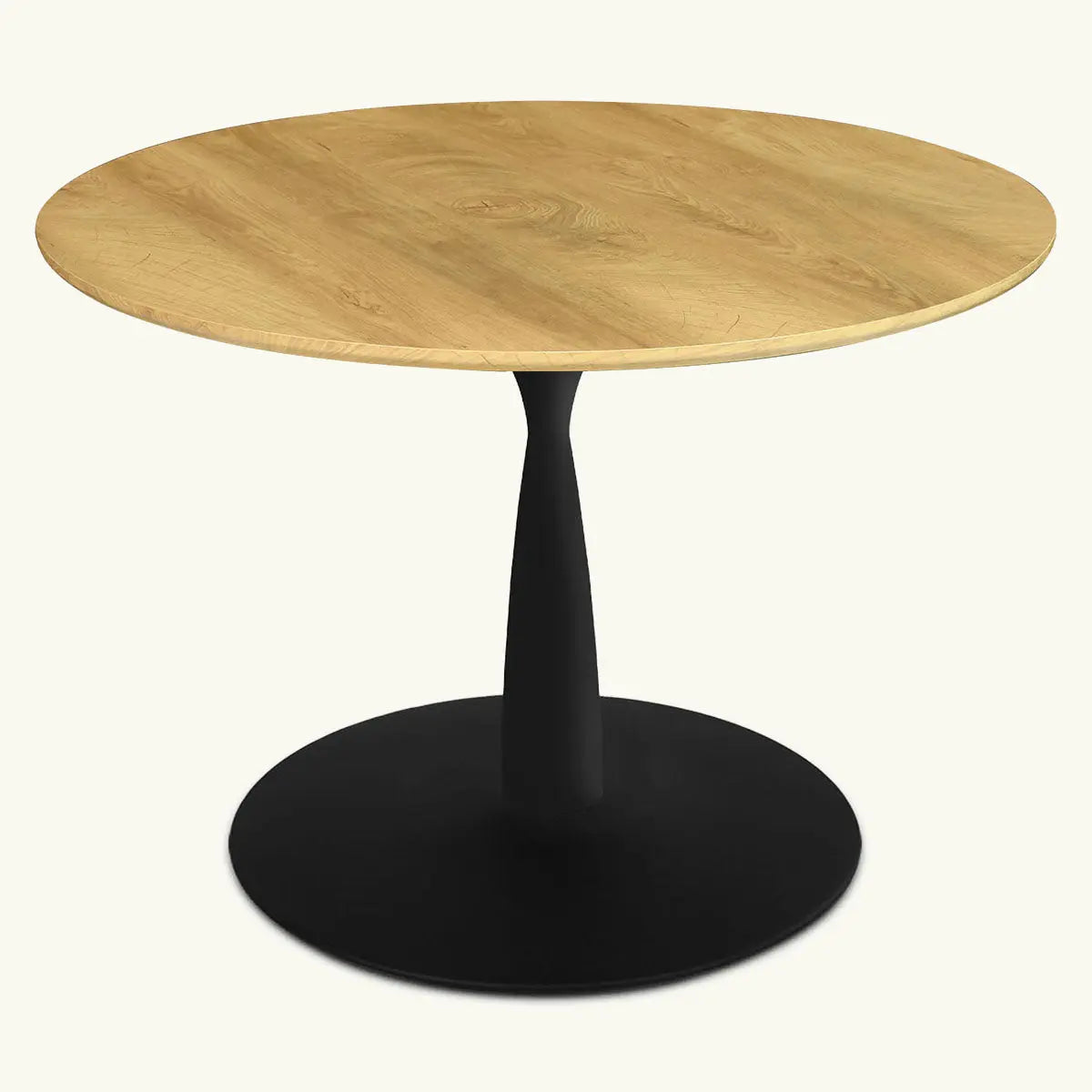 Harrison Modern Oak Round Pedestal Dining Table with black base, oak top in minimalist room.