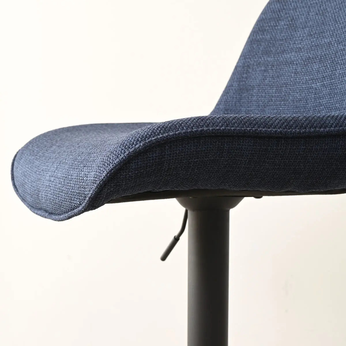 Close-up of Hunter Modern Upholstered Swivel Counter Stool in blue fabric on adjustable black base.