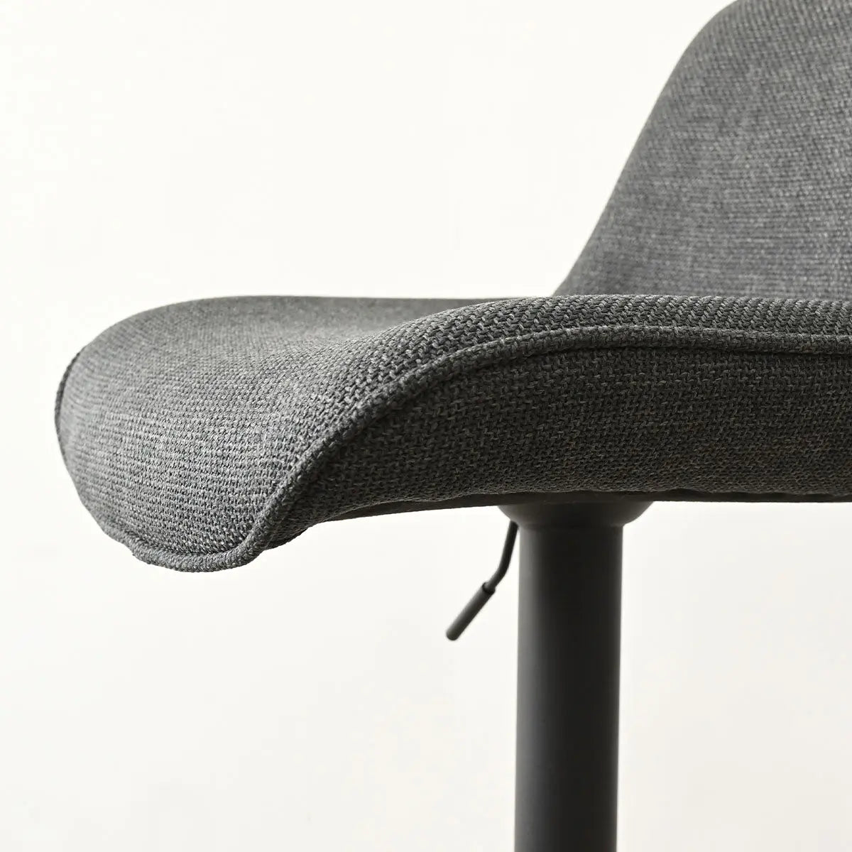 Close-up of Hunter Modern Upholstered Swivel Adjustable Counter Stool with textured fabric and sleek design.