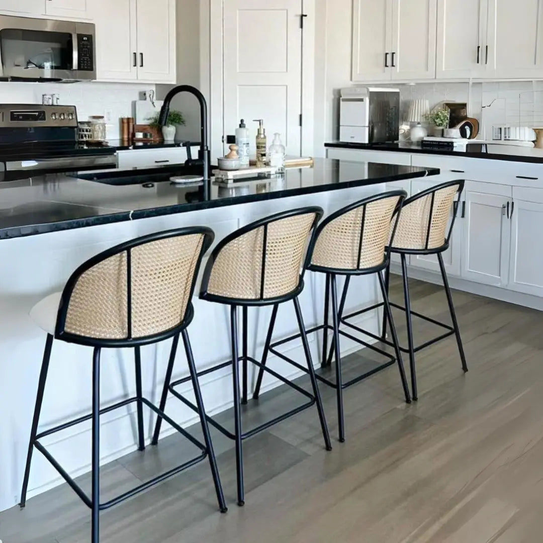 Jules Modern Upholstered Rattan Counter Stools in kitchen with white cabinets, hardwood flooring.