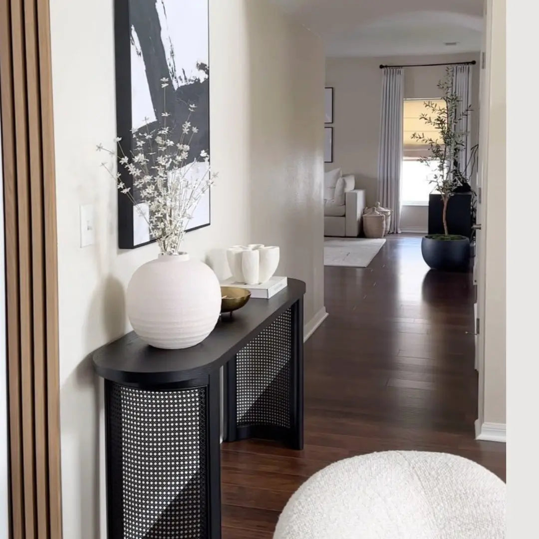 Aodai Modern Console Table in chic hallway with dark wood flooring and neutral walls.