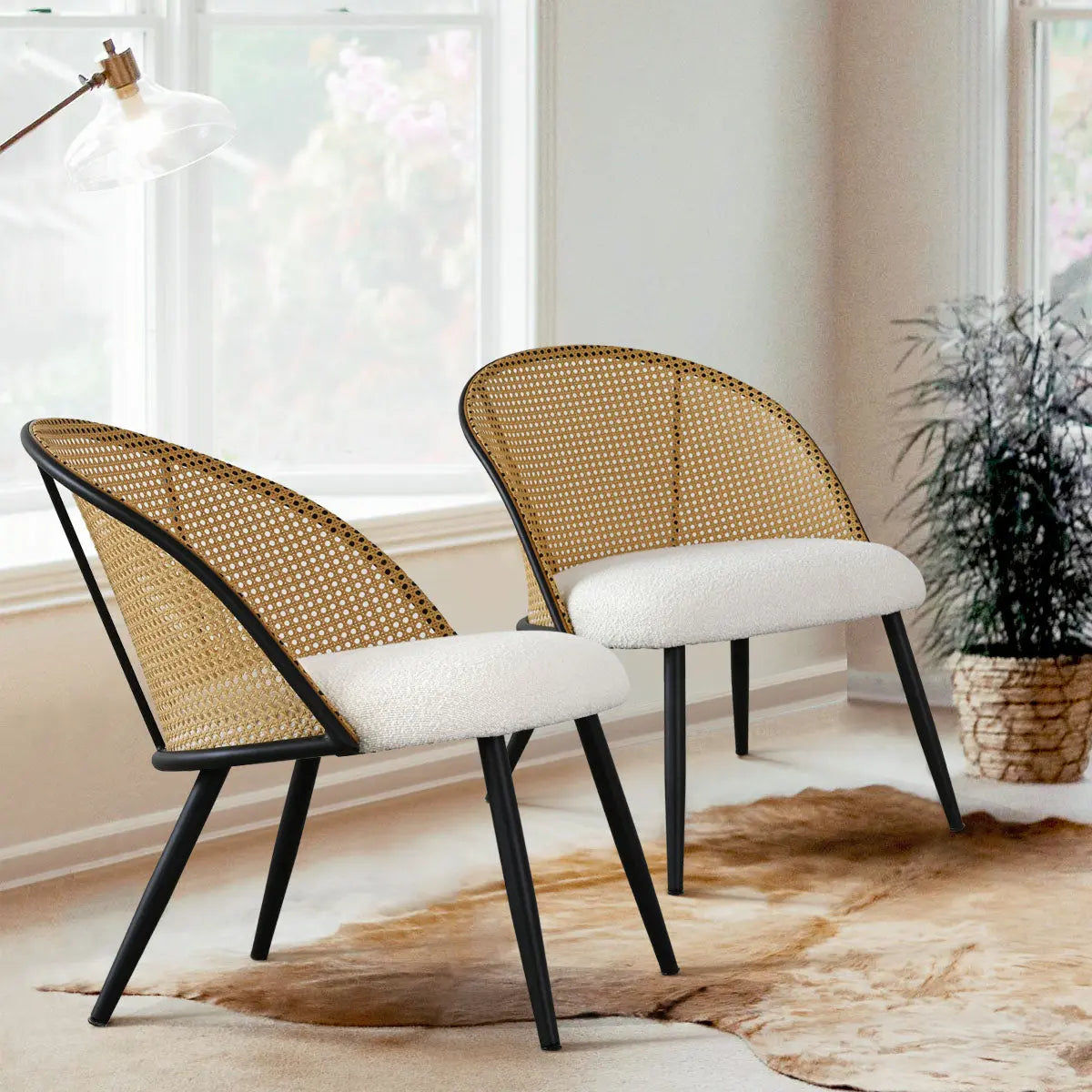 Jules Modern Upholstered Rattan Dining Chairs, set of 2, in cozy living room with neutral decor.