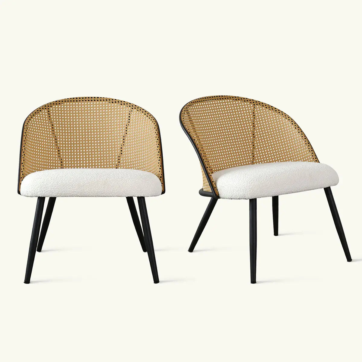 Pair of Jules Modern Upholstered Rattan Dining Chairs with woven backs and cushioned seats.