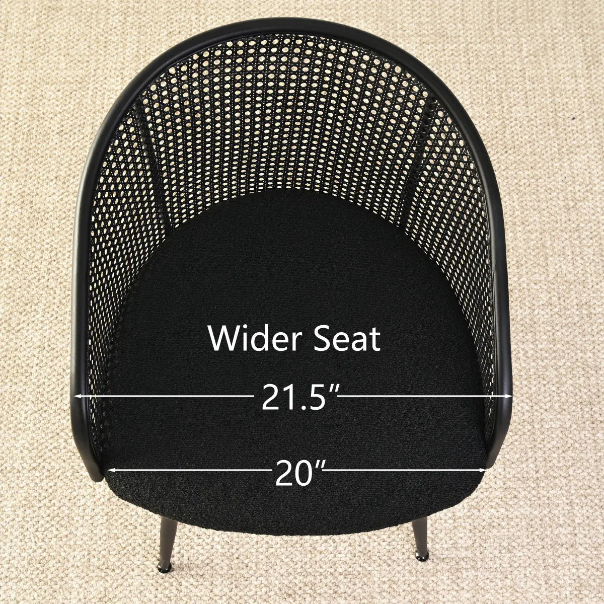 Jules Modern Upholstered Rattan Dining Chair with dimensions, black cushion on beige textured floor.