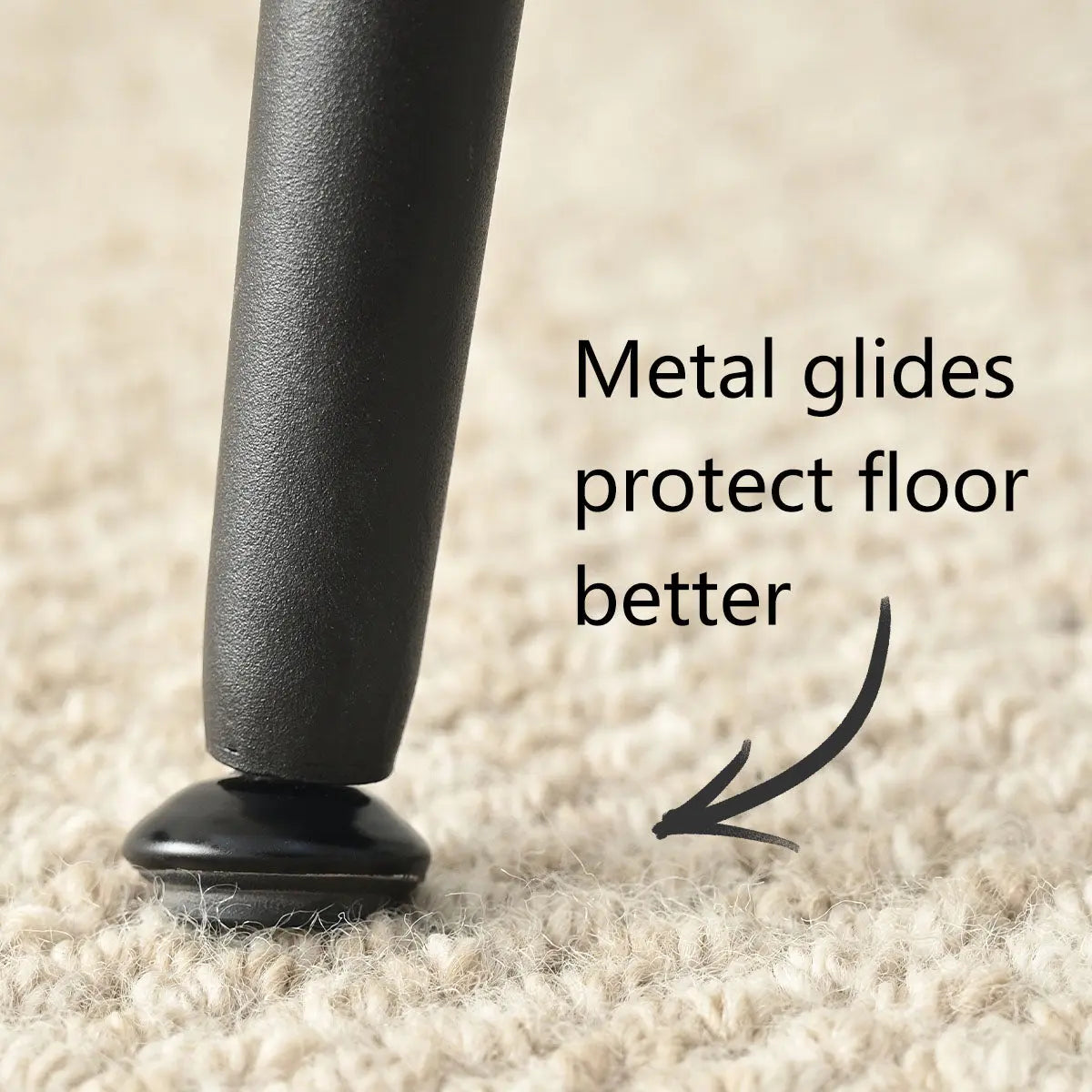 Close-up of metal glides on rattan dining chair leg protecting the floor surface.