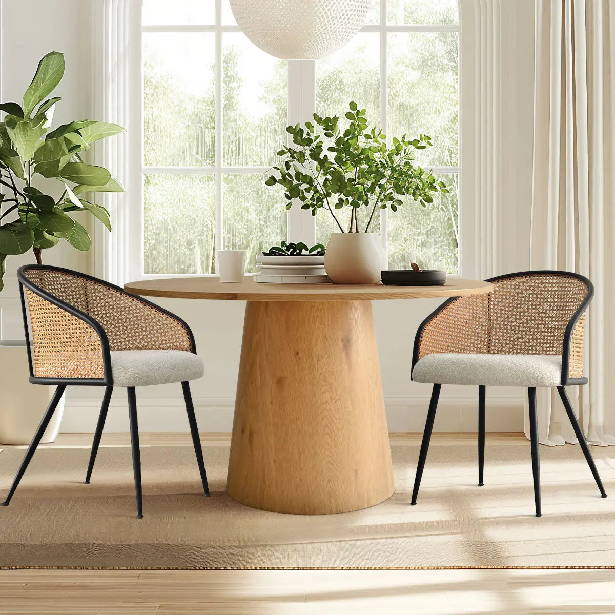 Jules Modern Upholstered Rattan Dining Chairs, wooden table, white curtains, rug in sunny dining room.