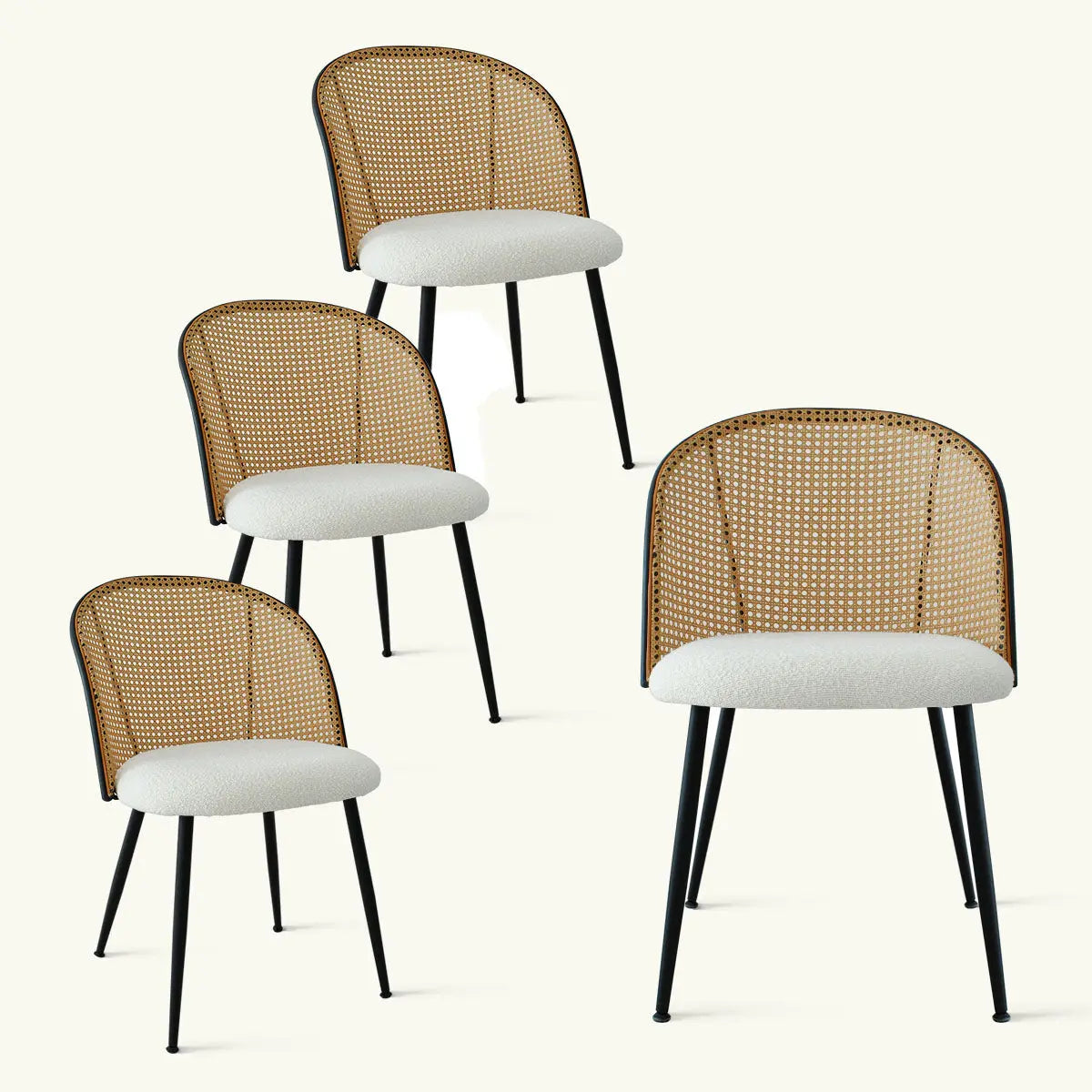 Set of 4 Jules Modern Upholstered Rattan Dining Chairs with black legs and white cushions.