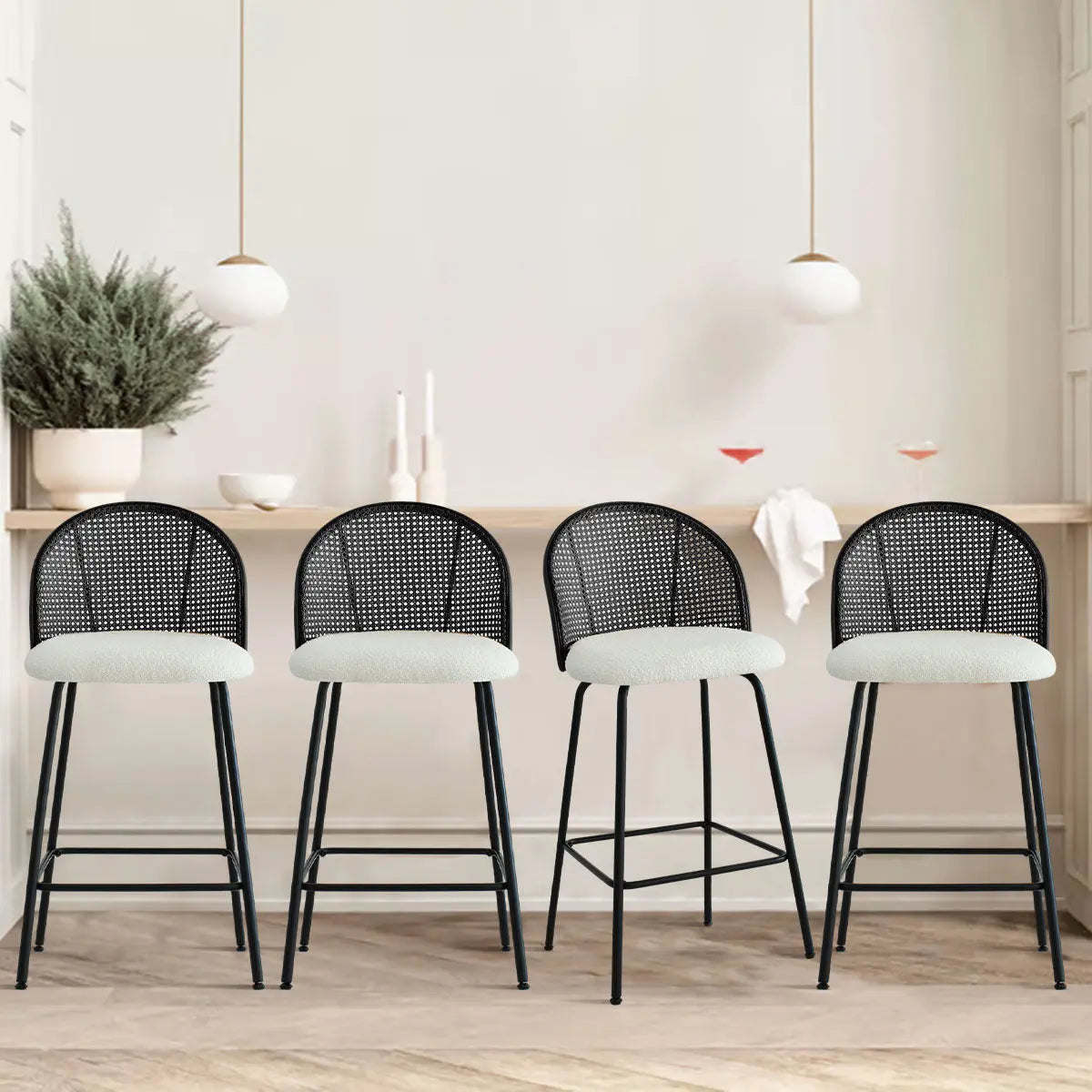 Jules Modern Upholstered Rattan Counter Stools in neutral kitchen with light hardwood flooring.