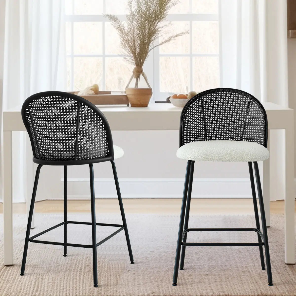 Jules Modern Upholstered Rattan Counter Stool in dining room, white table, beige rug, large window.