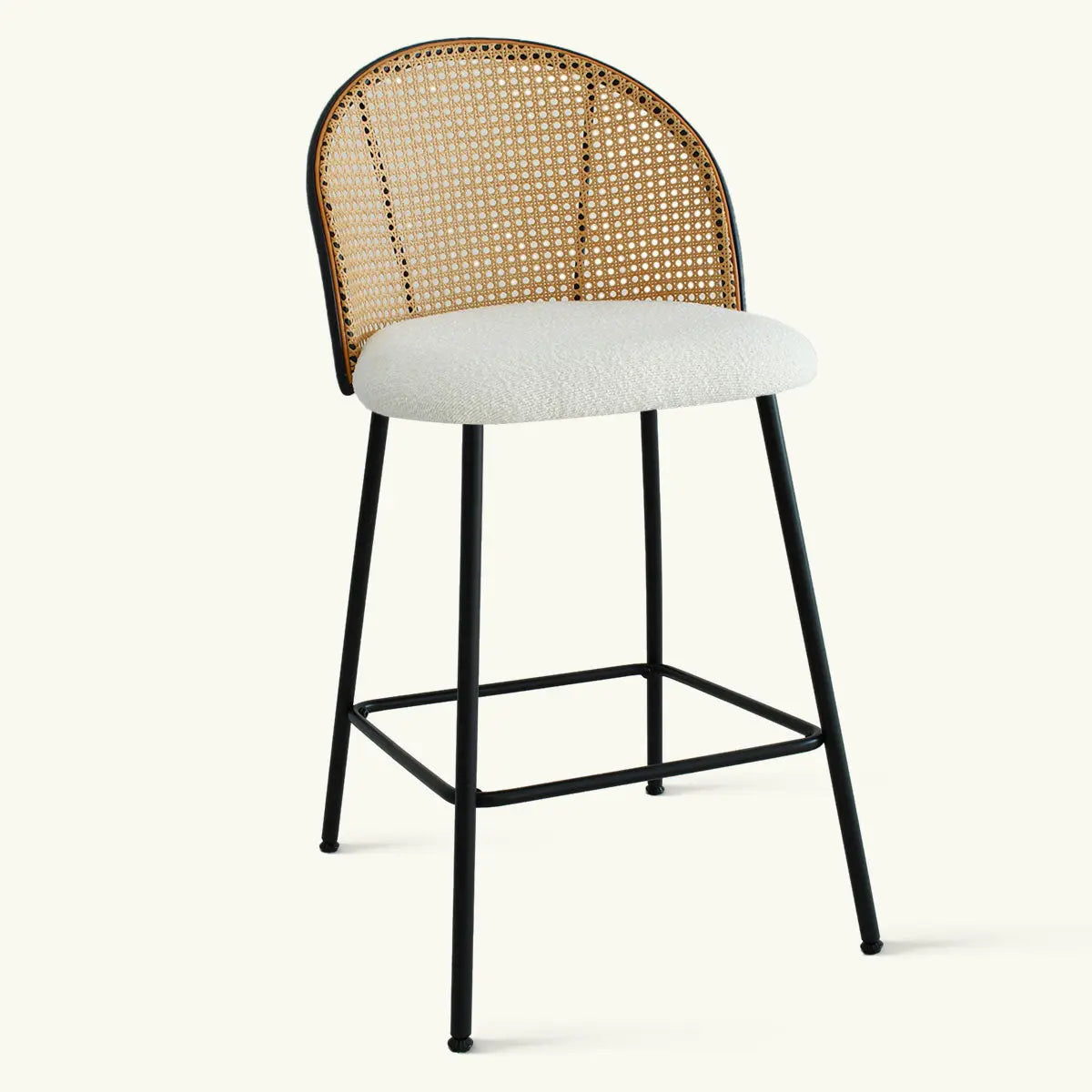 Jules Modern Upholstered Rattan Counter Stool, black metal frame, white seat cushion, curved design.