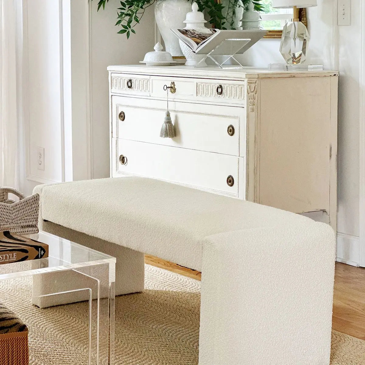 Kaia Modern Beige Upholstered Bench in neutral room with white dresser and woven rug flooring.